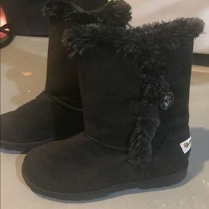 Woman’s black boots